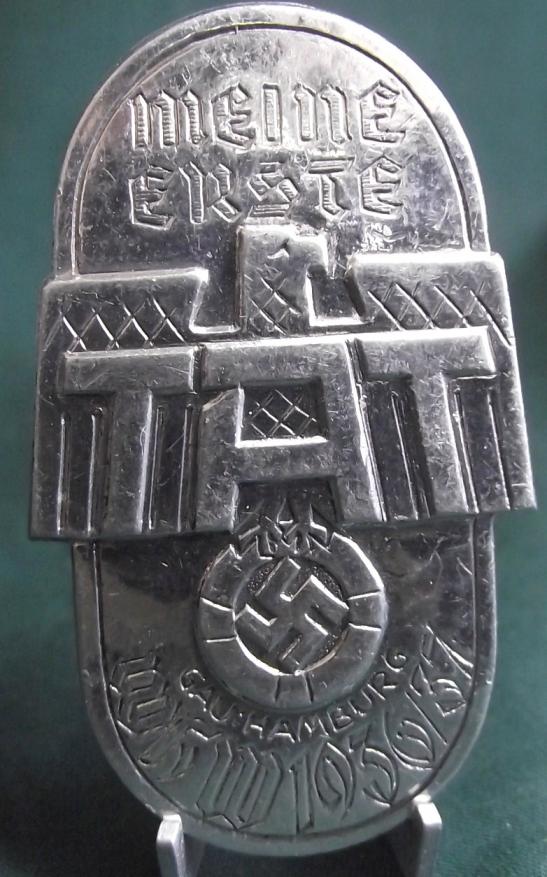 WHW 1937 Gau Hamburg ''TAT'' Event Badge/Tinnie.
