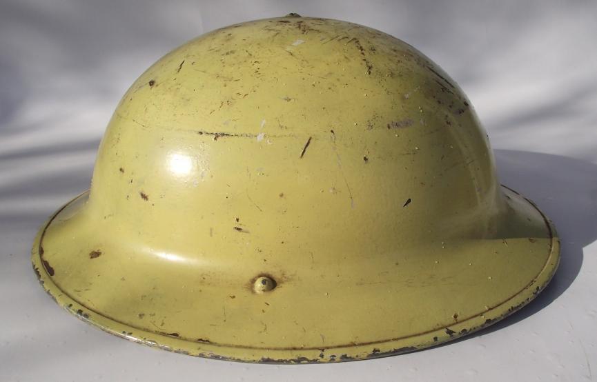 Yellow British MKII Home Front Helmet.