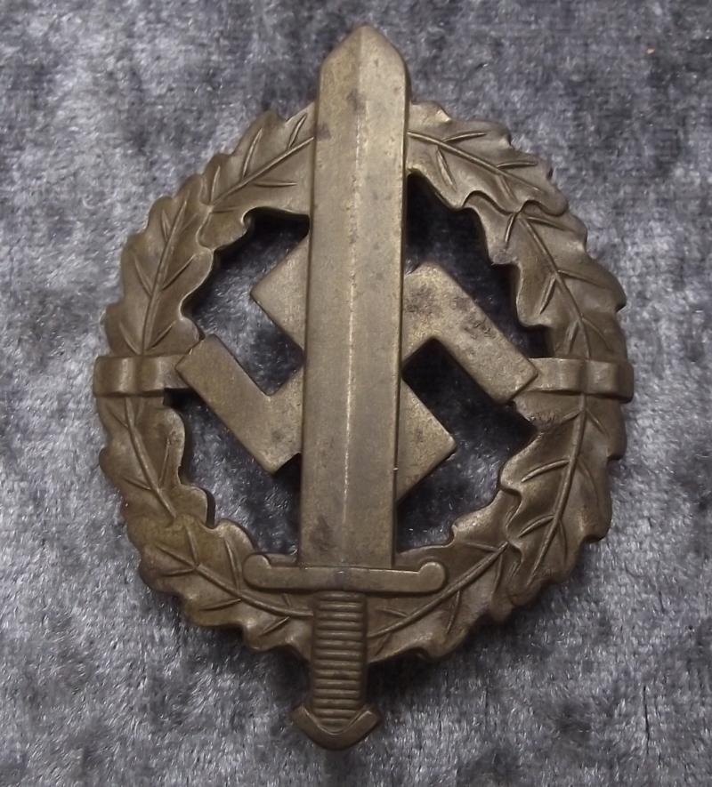 Numbered SA Bronze Sports Badge.