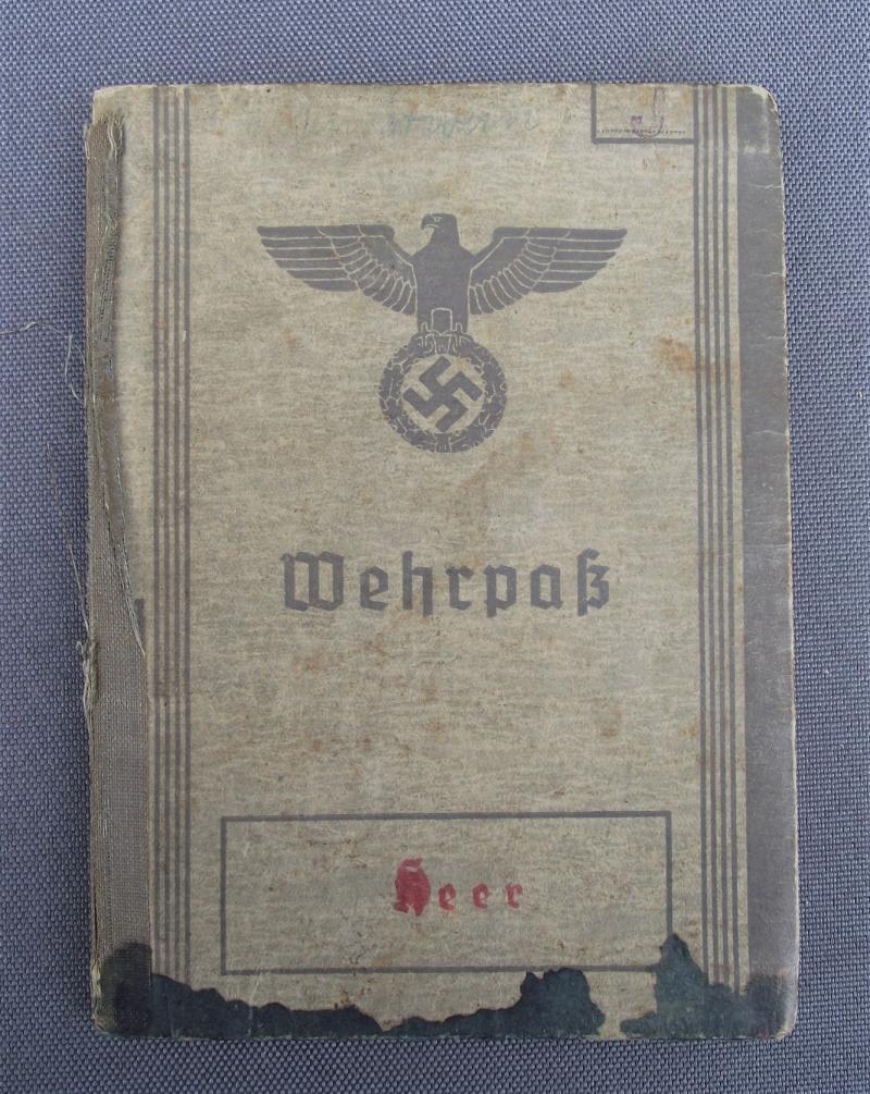 WW2 German Wehrpass. Inf-Reg.519, Iron Cross, Silver Wound.
