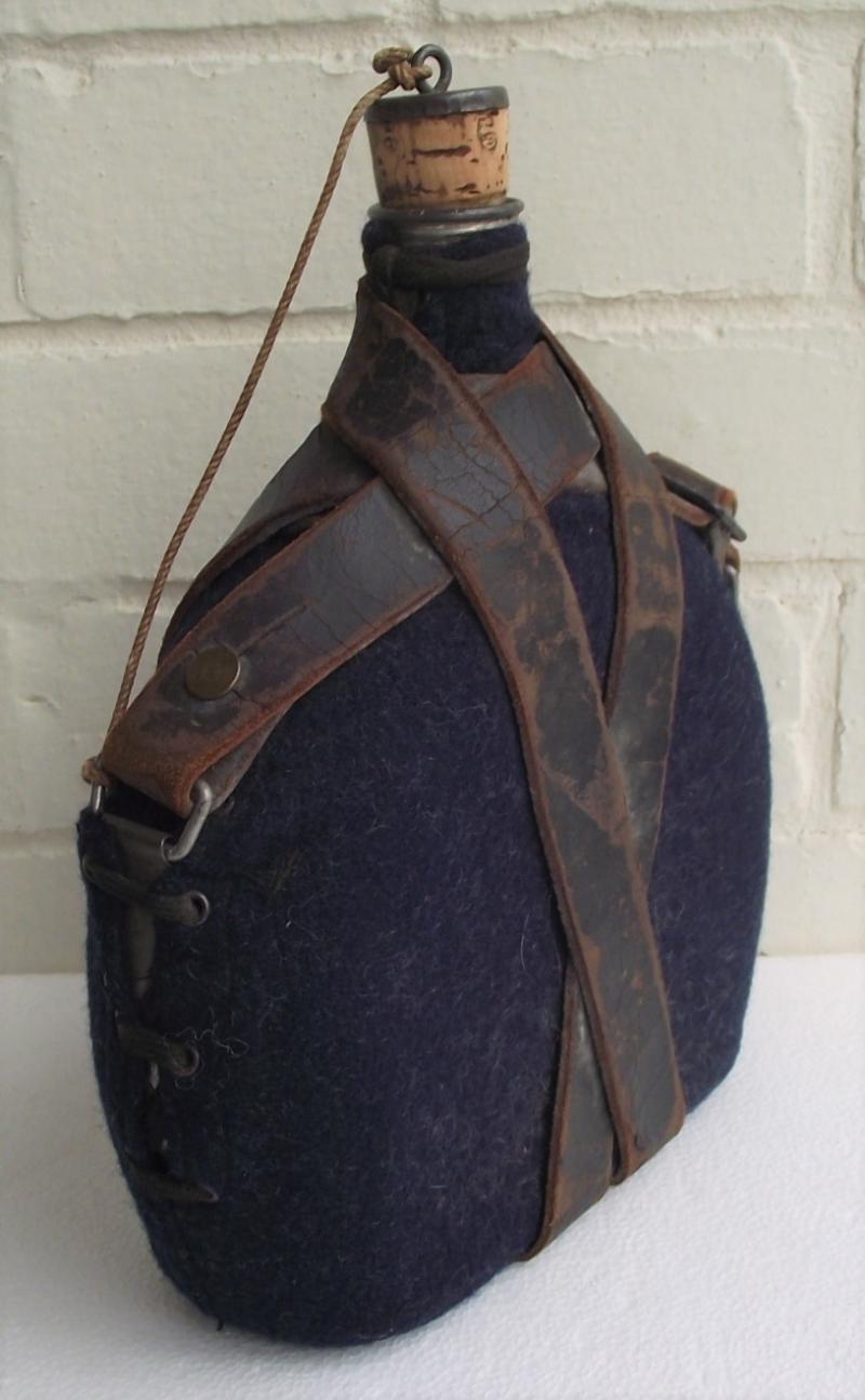 WW2 Named French Water Bottle and Carry Strap.