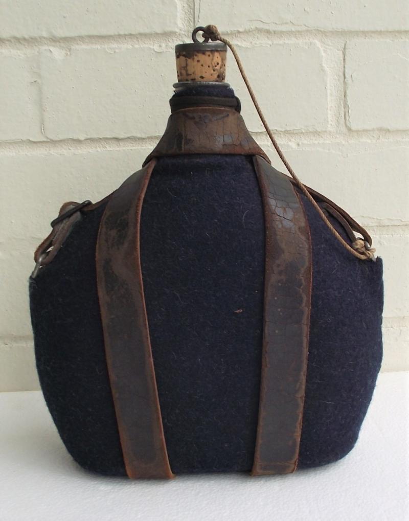 WW2 Named French Water Bottle and Carry Strap.