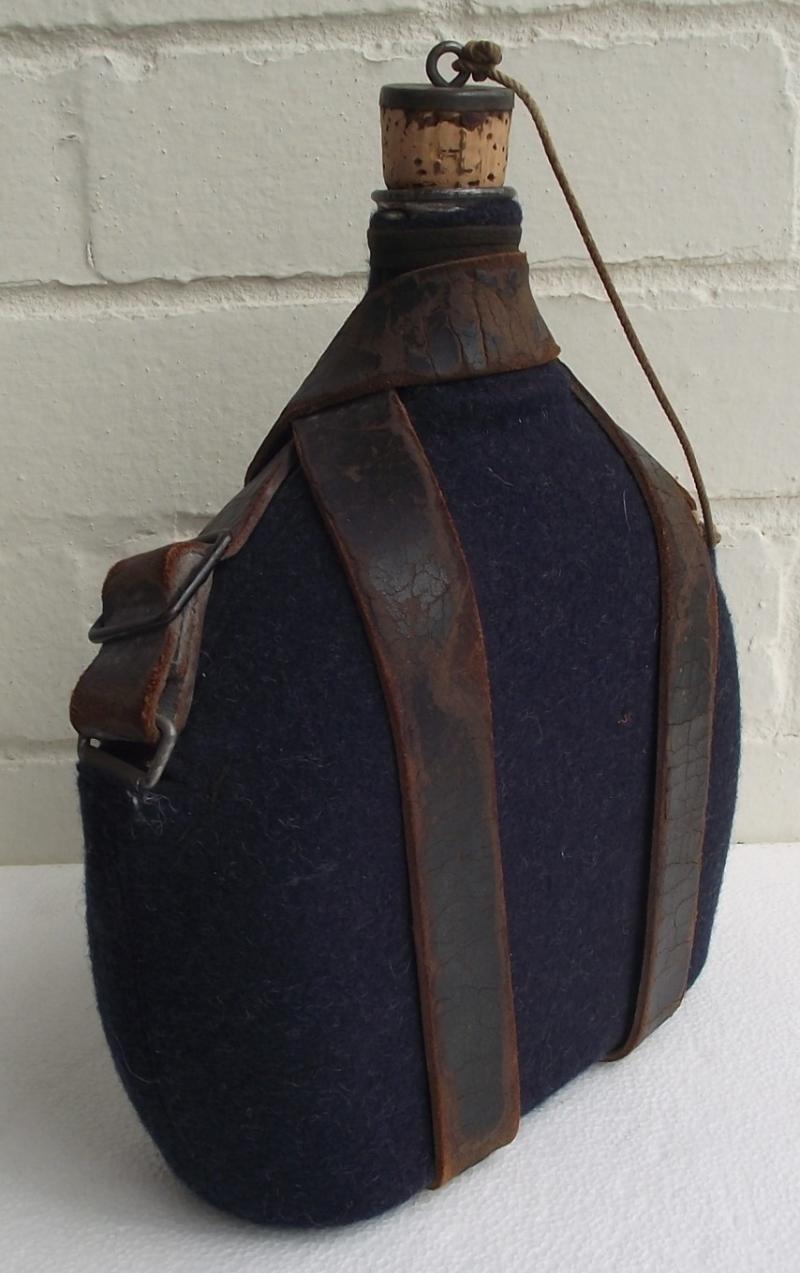 WW2 Named French Water Bottle and Carry Strap.
