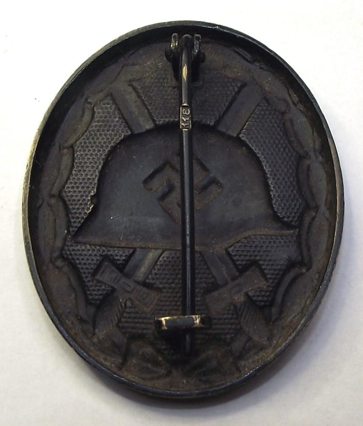 WW2 German Black Wound Bade. Brass Manufactured MM/118, August Menze & Sohn.