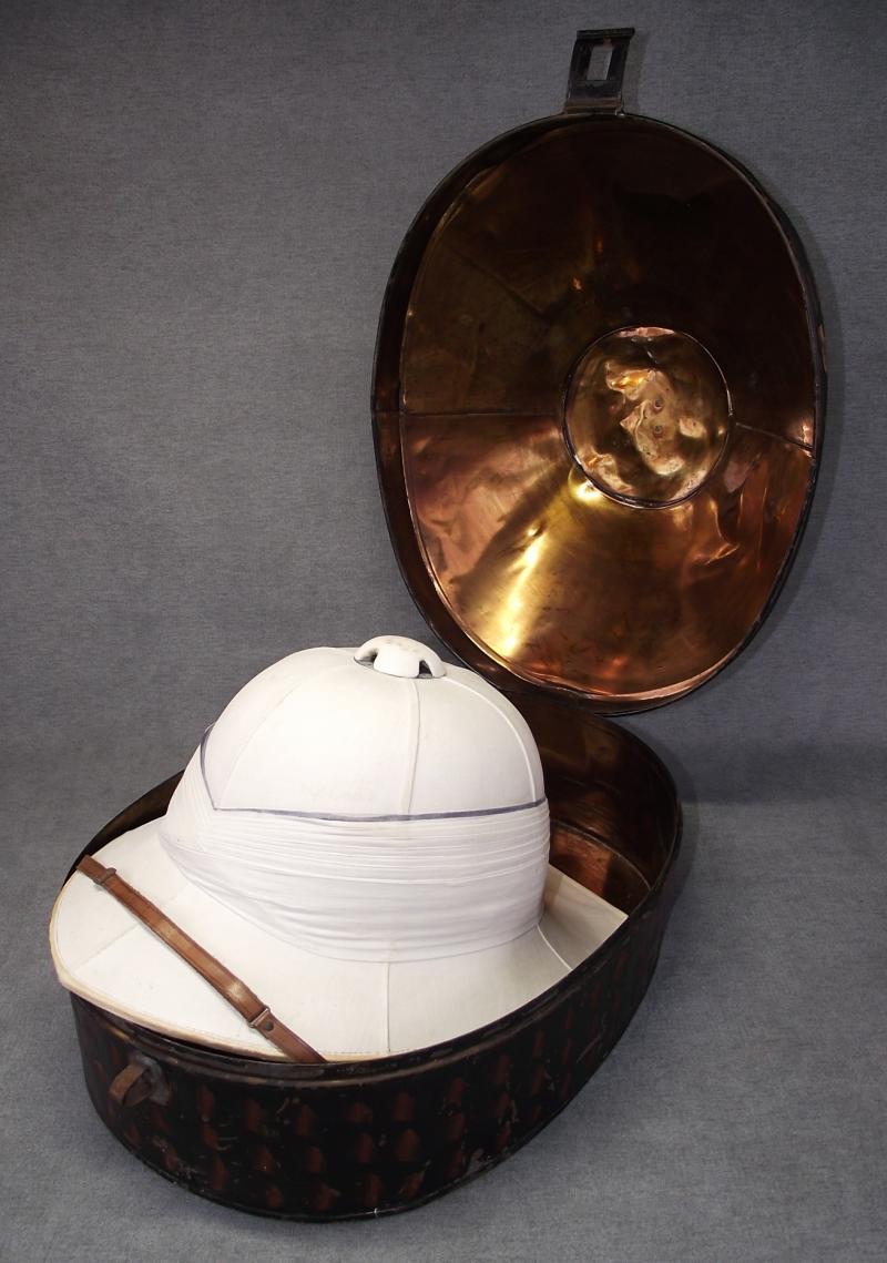 British Royal Navy Officers Foreign Service Helmet and Tin. Captain R.L.Moore C.B.E. and Jutland Promotion.