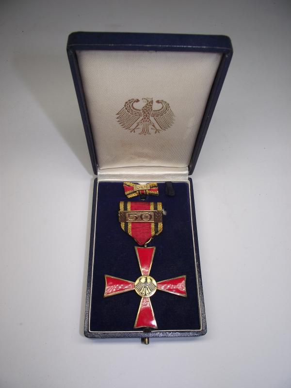 Boxed Bundesverdienstkreuz- German Order of Merit Medal with 50 Year Jubilee Bar. C.E.Junker.
