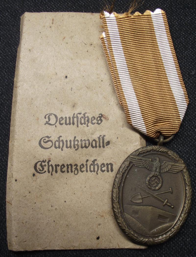 WW2 German West Wall Medal in Issue Envelope. Carl Poellath.