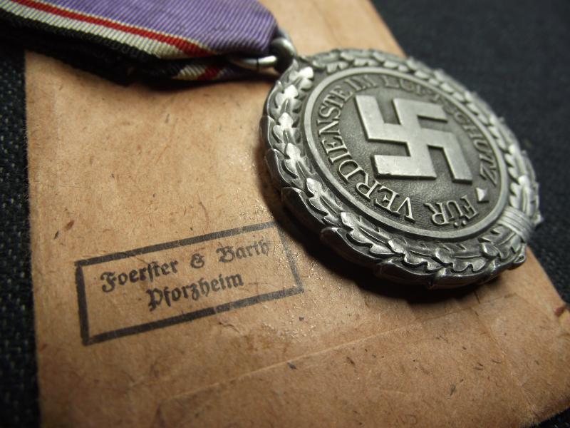 2nd Class Luftschutz Medal and Paper Packet of Issue. Foerster & Barth