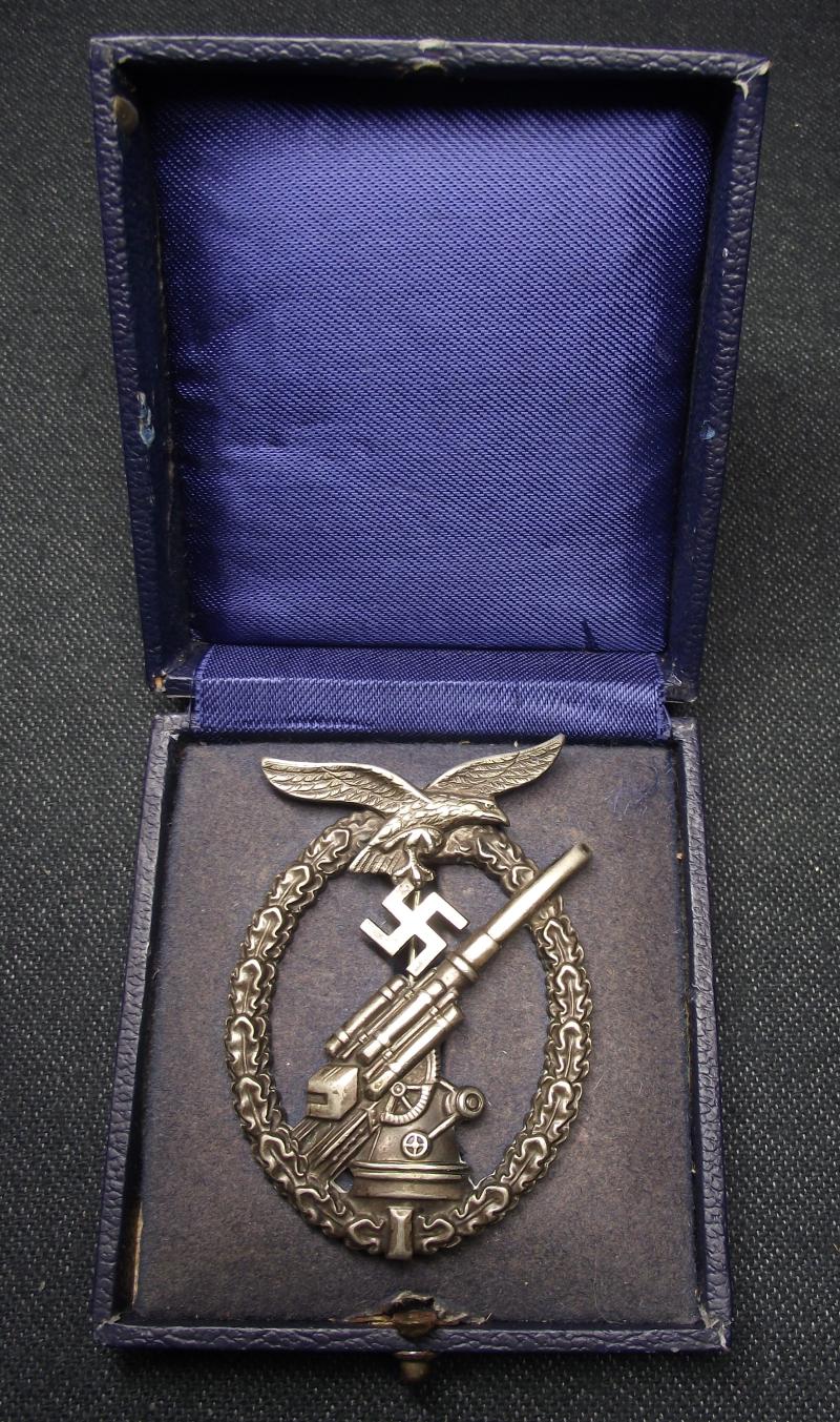 WW2 German Cased Luftwaffe Nickle Silver Ball Hinge Flak Badge..