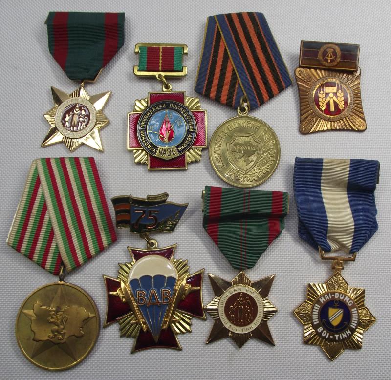 8 X Communist Medals.