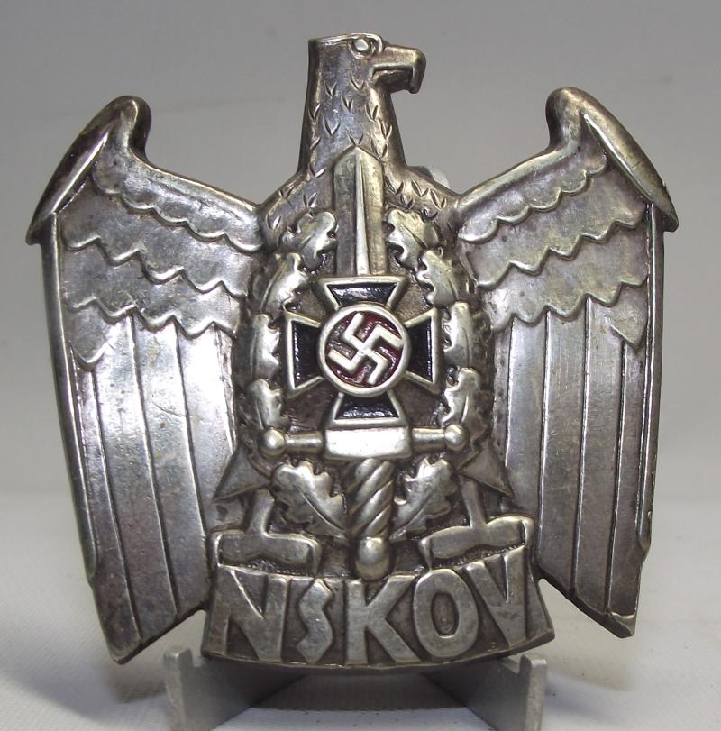 NSKOV Cap Badge.