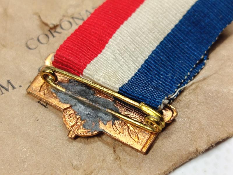 Elizabeth II Coronation Commemorative Medal and Paper Packet of issue.