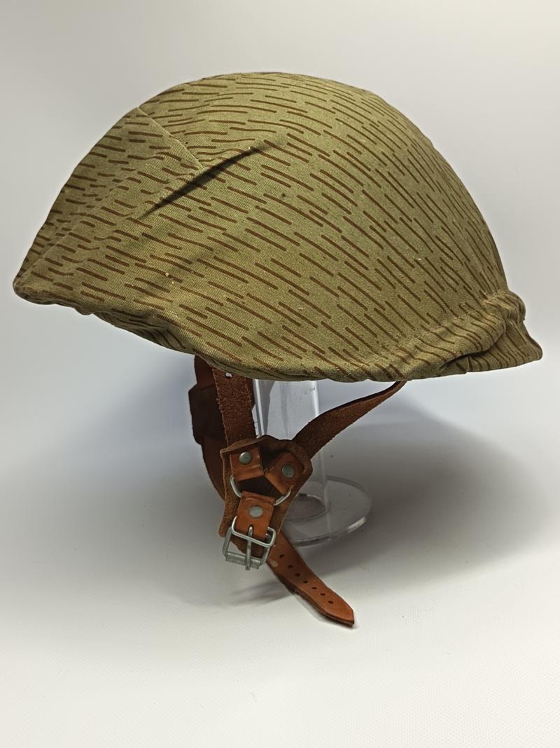 East German M56/66 Steel Helmet and Strictarn Cover.