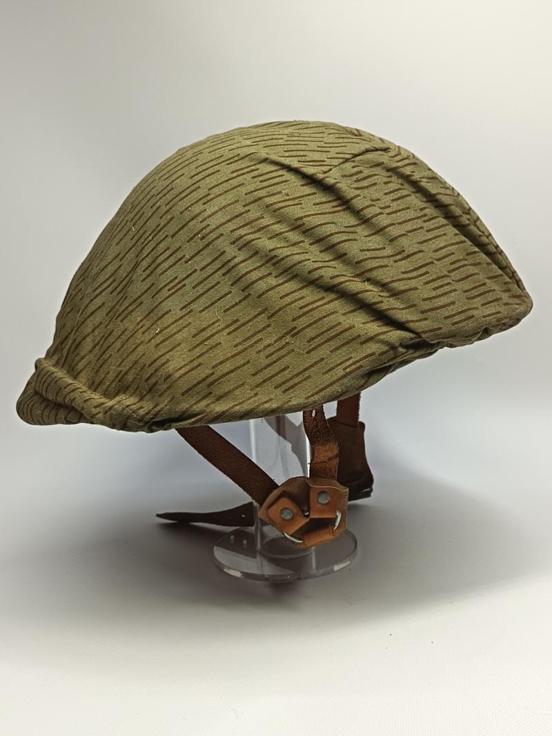 East German M56/66 Steel Helmet and Strictarn Cover.