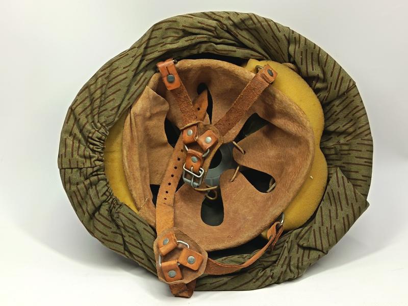 East German M56/66 Steel Helmet and Strictarn Cover.