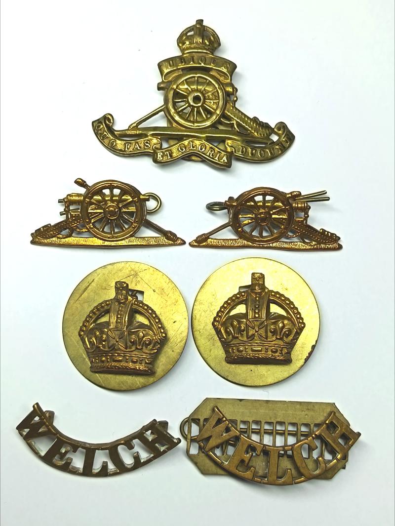 RA and Welch Regiment Brass Insignia.